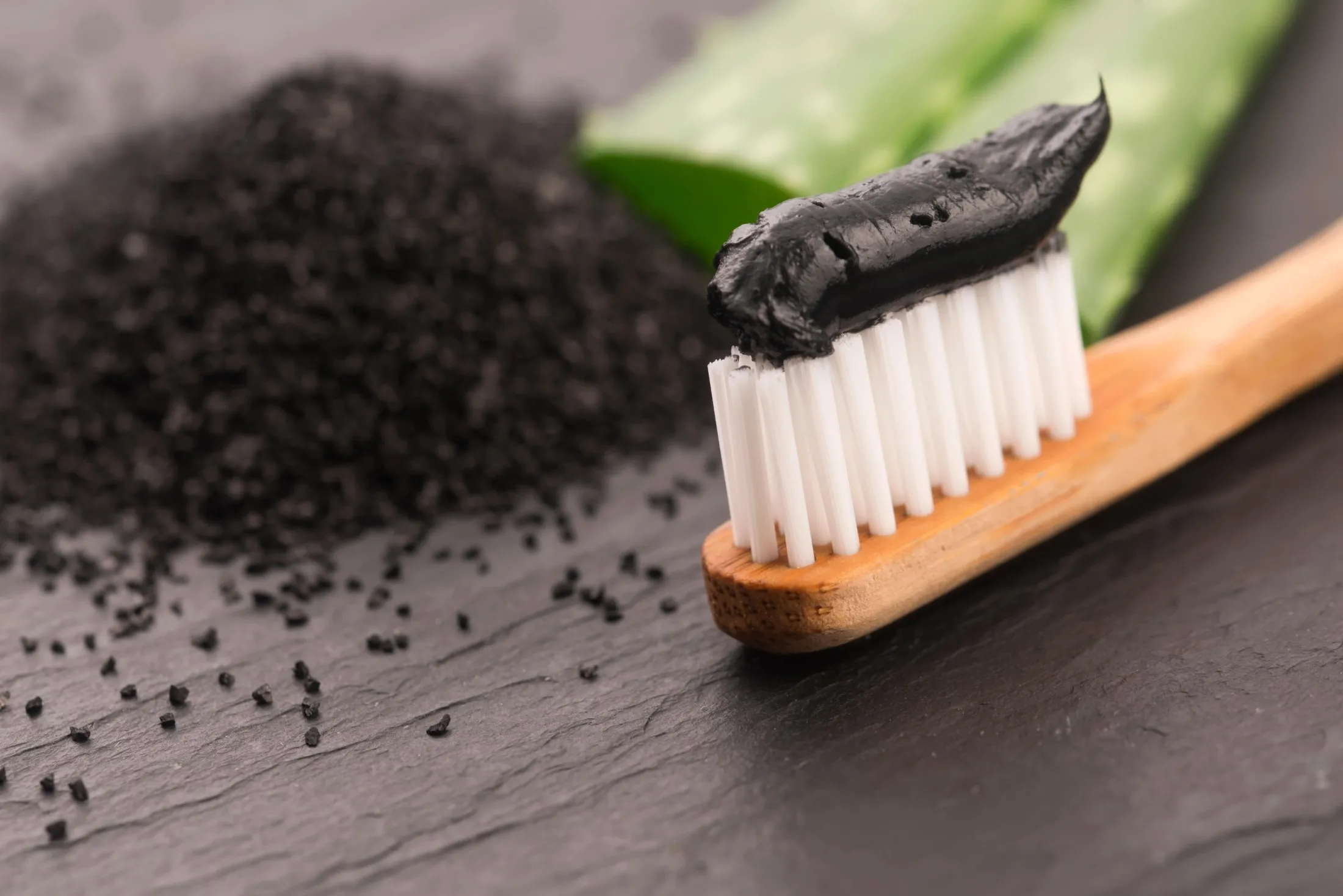 Charcoal Toothpaste on a Tooth Brush