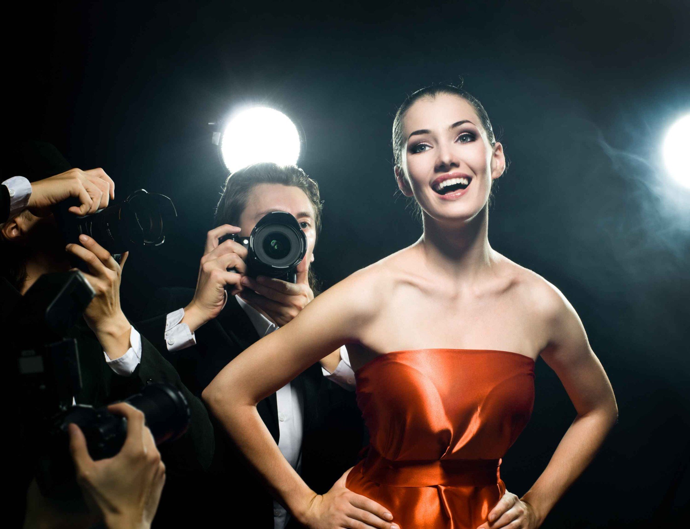 Photographers Taking Picture of Film Star