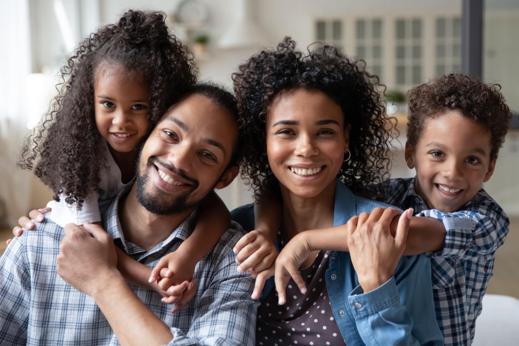 happy african american family couple parents